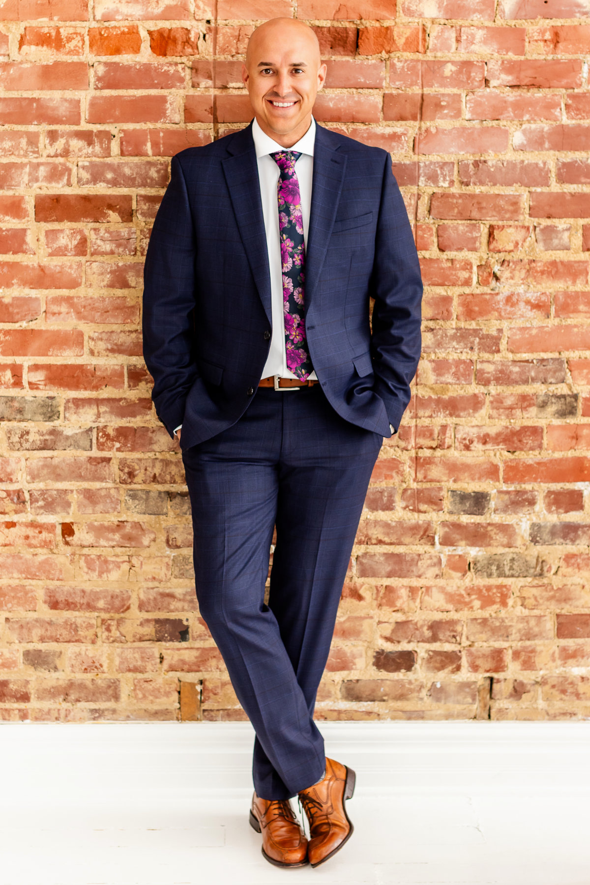 web headshots brick wall