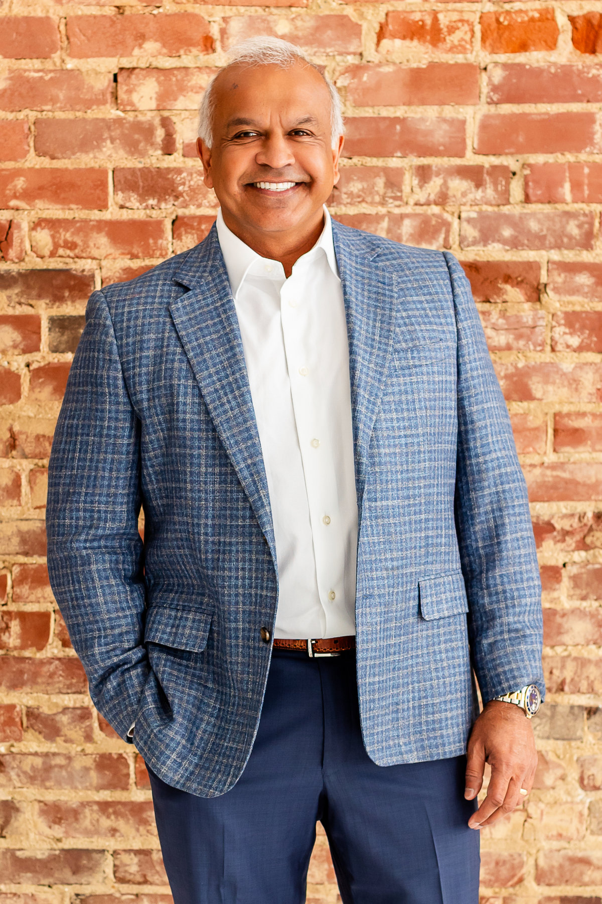 web headshots brick wall